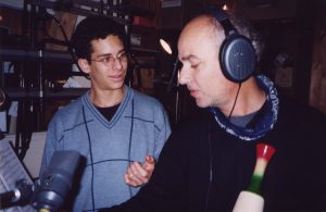 With double bass virtuoso Edicson Ruiz dubbing a güiro part for a recording (Berlin, 2002)